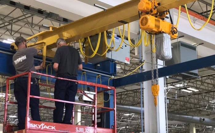 Crane Technicians Servicing An Overhead Crane 